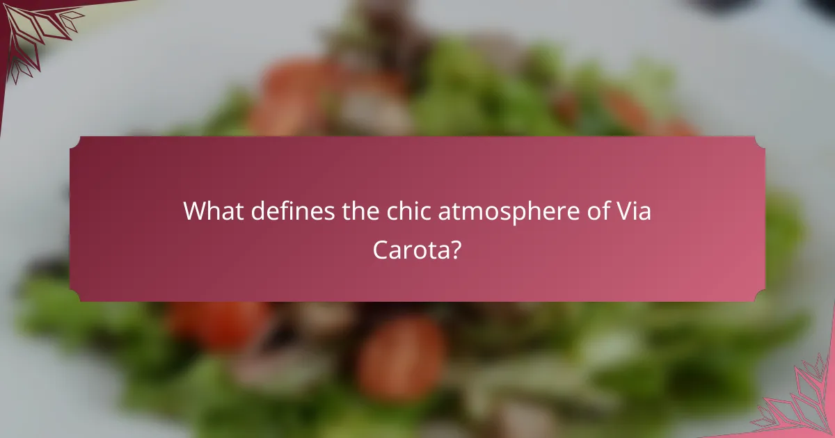 What defines the chic atmosphere of Via Carota?